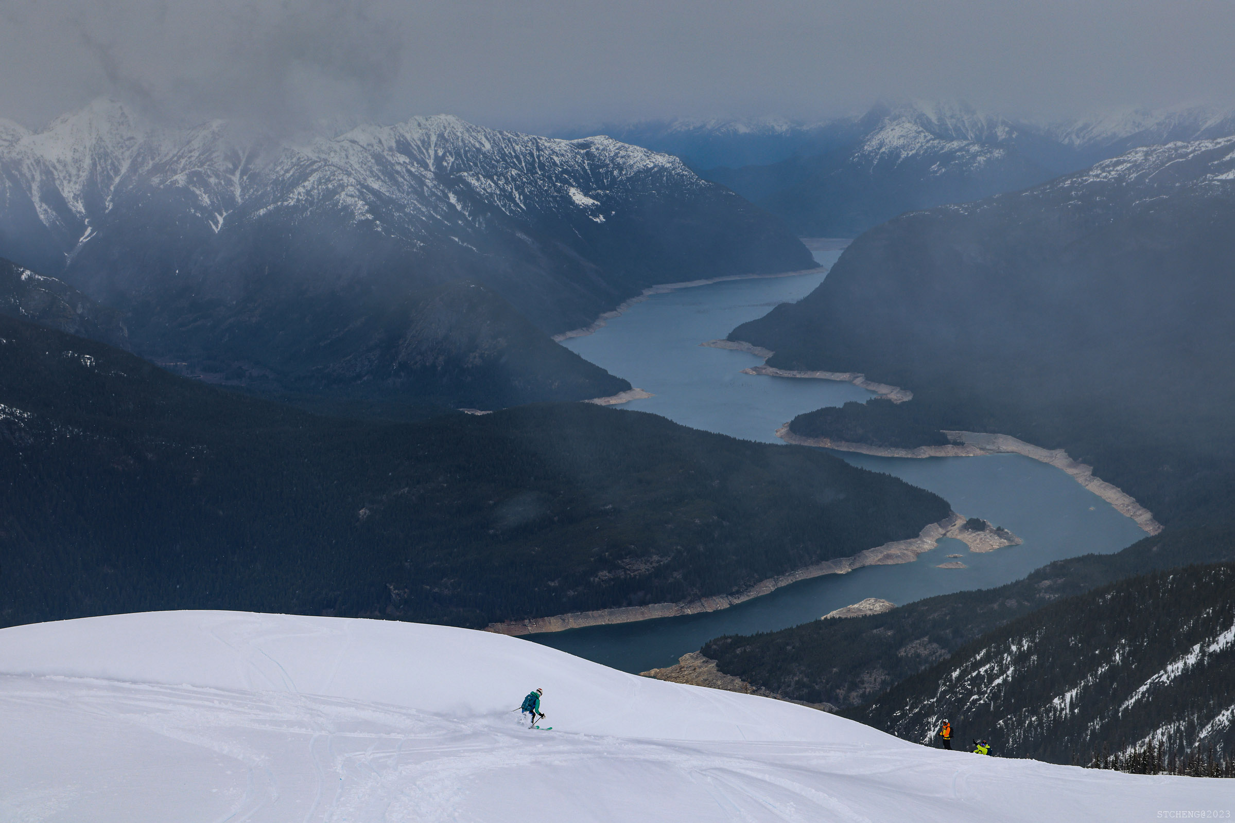 Skiing Towards Ross Lake Under Cloudy Sky